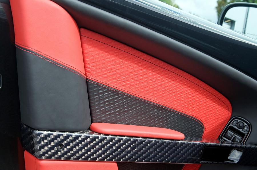 Детали интерьера Aston Martin DB9 Cyrus by Mansory 2009 года  (фото 13 из 34)